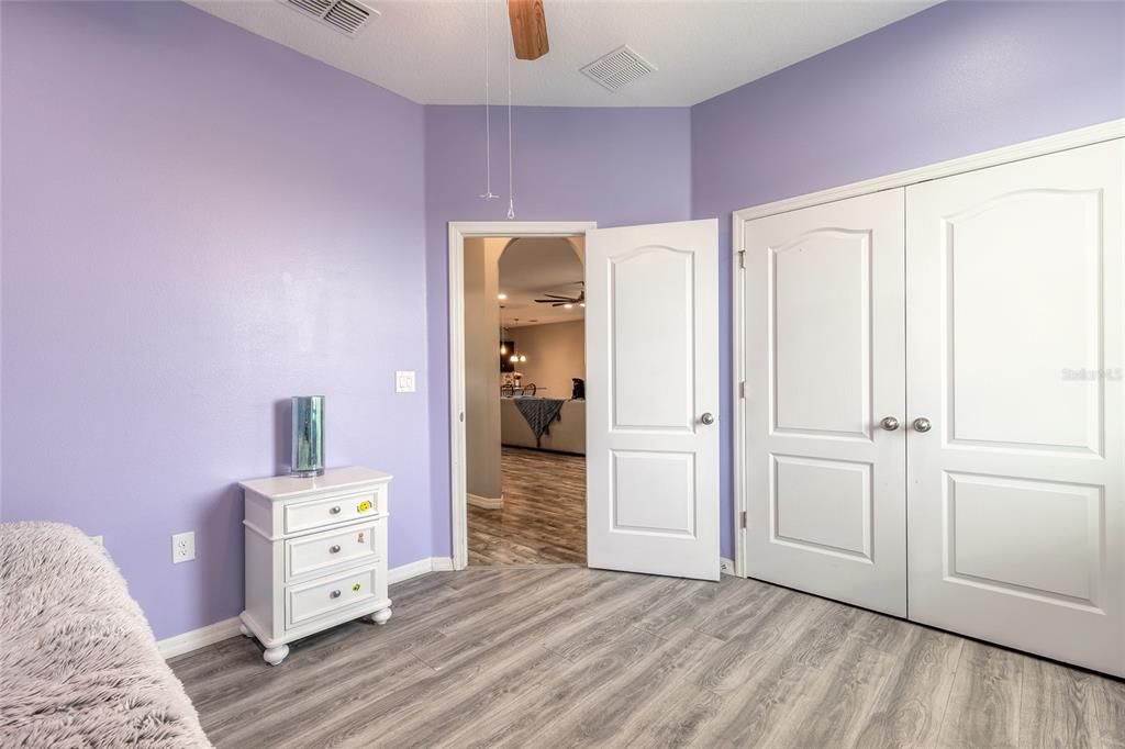 bedroom 2 with closet view