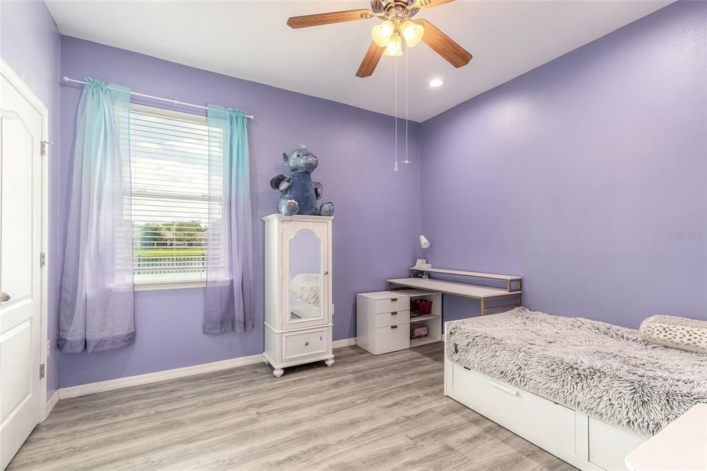 bedroom 2 with window towards pond