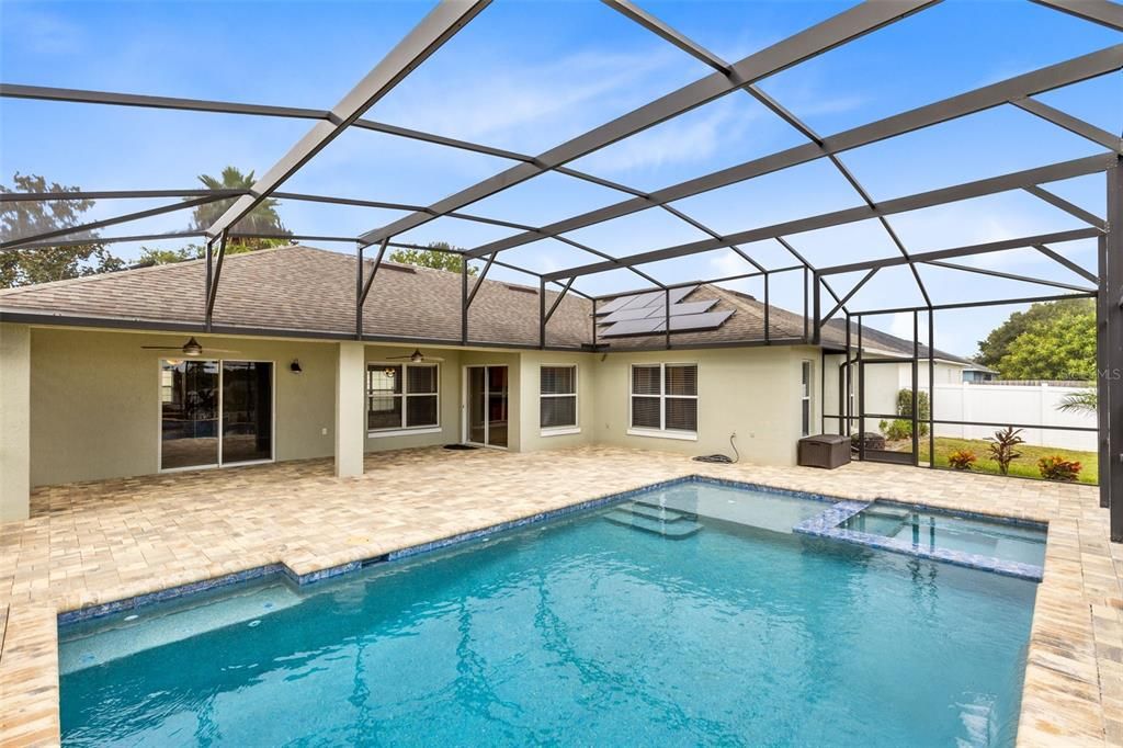 Tons of outdoor space for relaxing and entertaining with a large covered lanai.