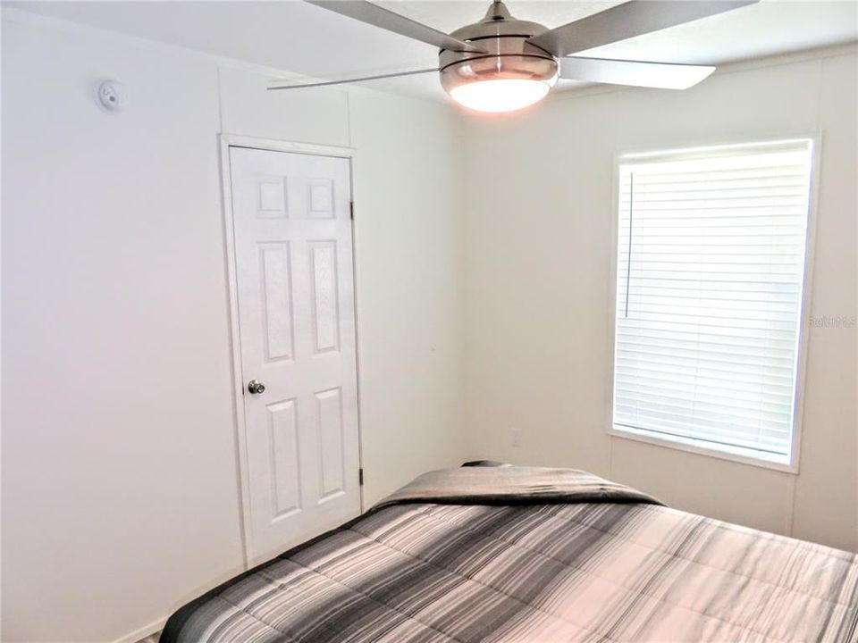 Guest Bedroom 1 with walk in closet