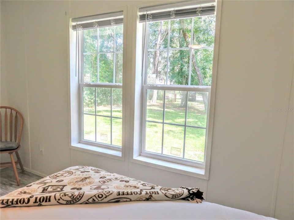 Privacy and country view! Large windows for natural light.