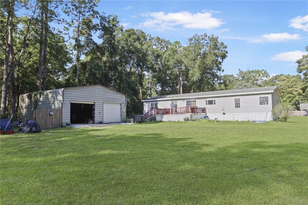 Back view of the home and detached garage