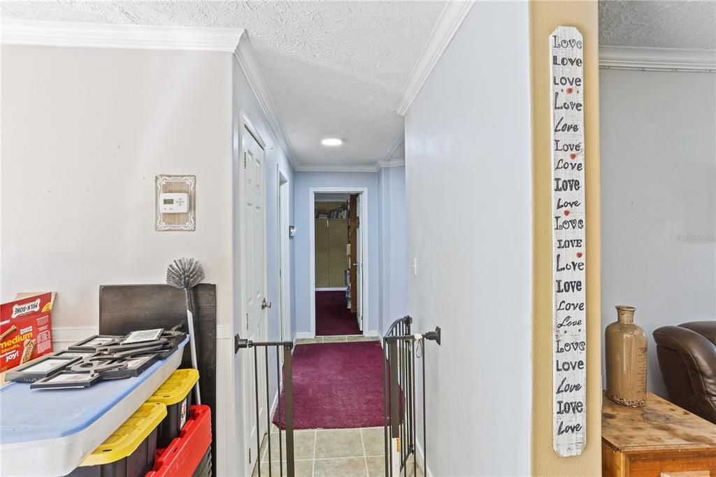 View down the split bedroom hallway