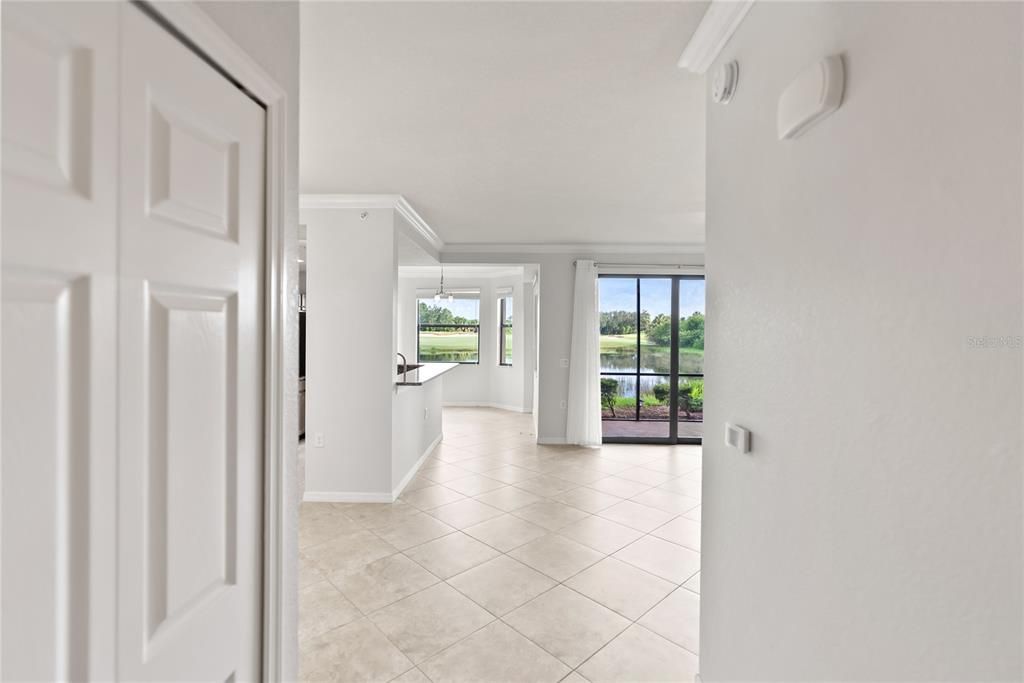 Front Entry Hall, passes by both bedrooms and bathrooms before entering living/dining/kitchen area of the home (door on left hand side of the picture is laundry room)