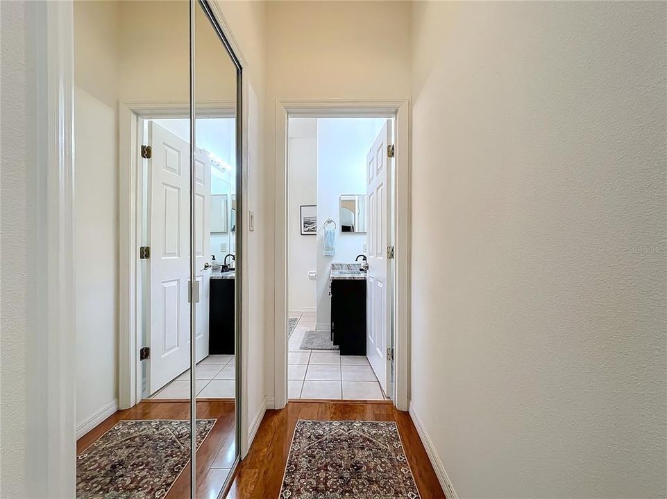 Walk-in closet leading to en-suite bath