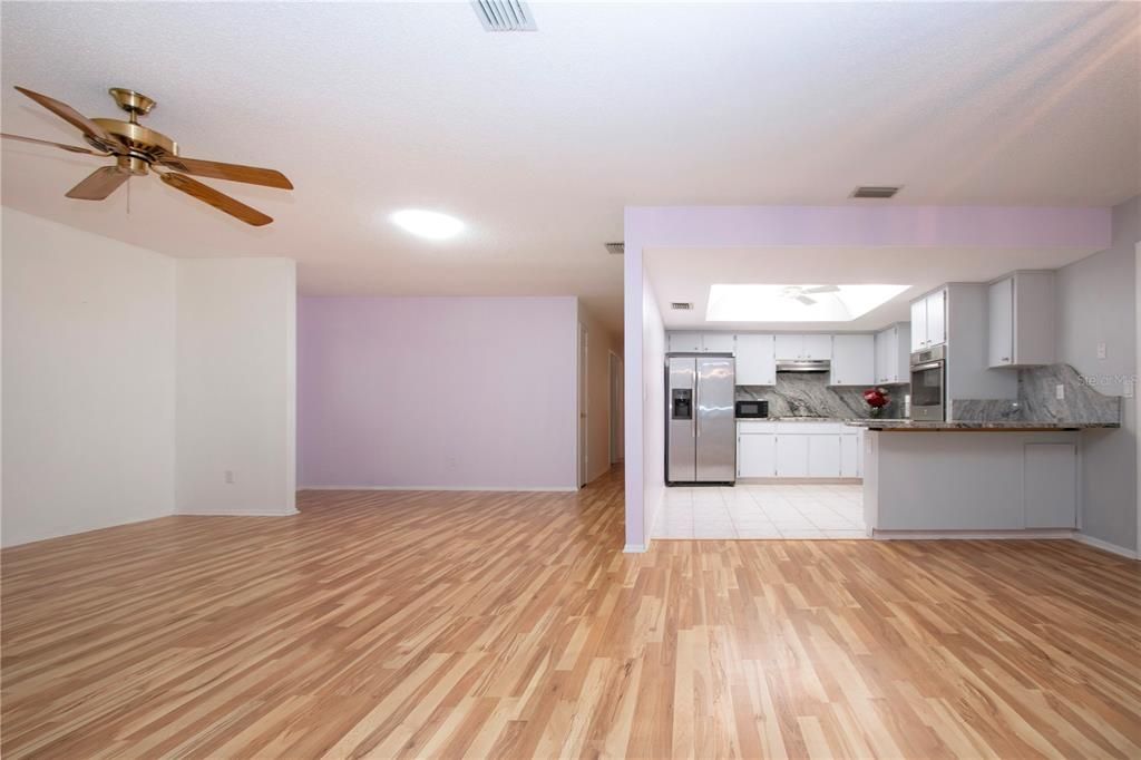 view of kitchen from dinignroom and livingroom