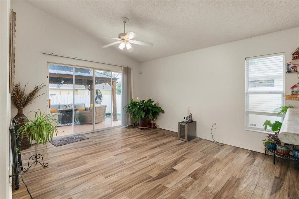 Family room with sliders leading to the patio/backyard