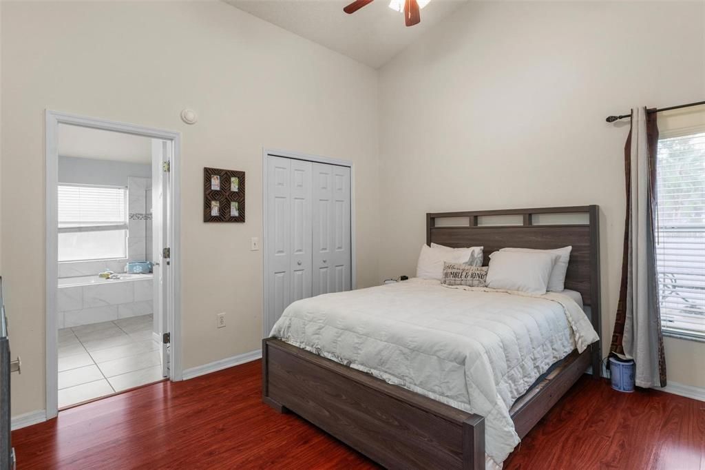 Primary bedroom with walk-in closet