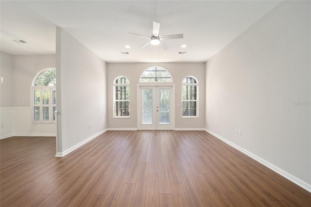 Living Room with French Doors to Birdcage