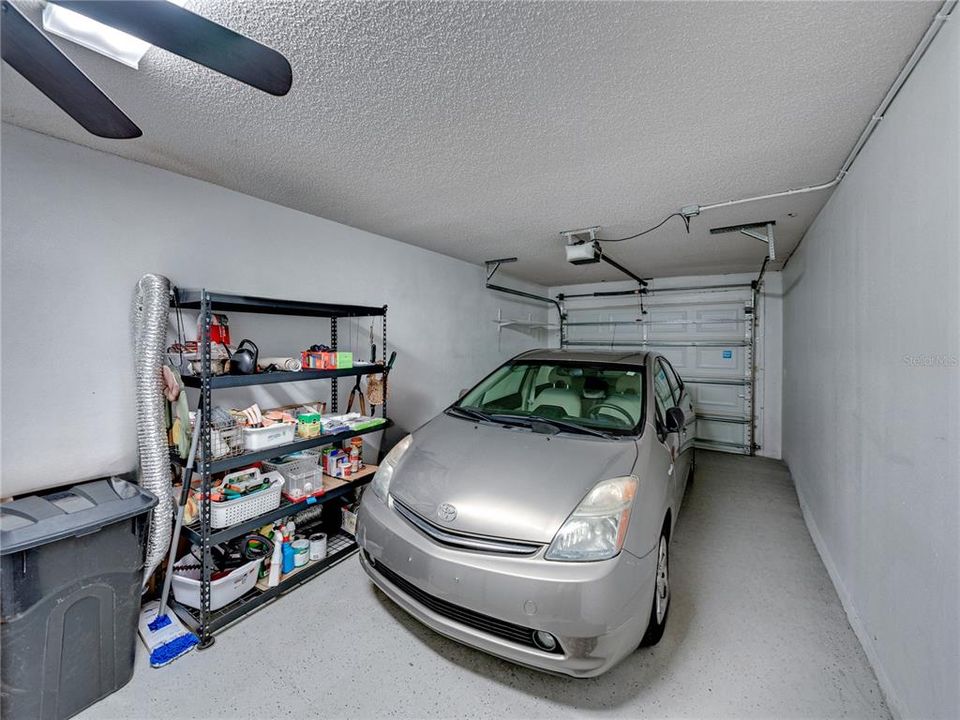 Oversized garage big enough for a car and space for golf cart in front~