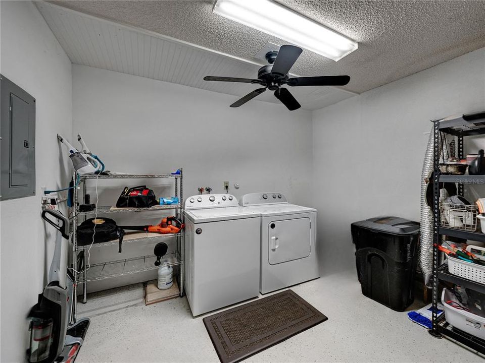 Garage access right from kitchen with convenient laundry station~