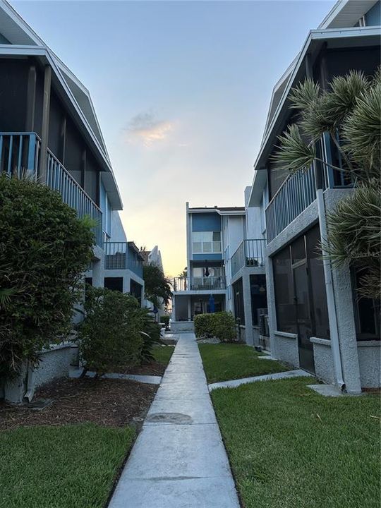 Walkway to condo, from bay side.