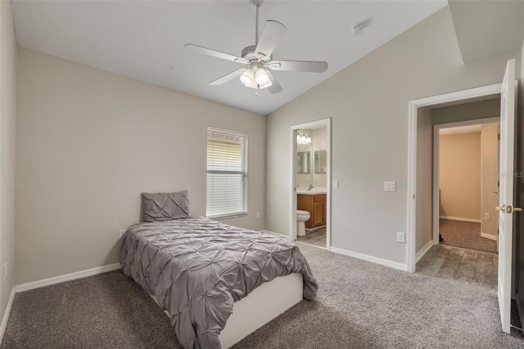 Bedroom 3 with Pocket Door Leading to Jack and Jill Bathroom