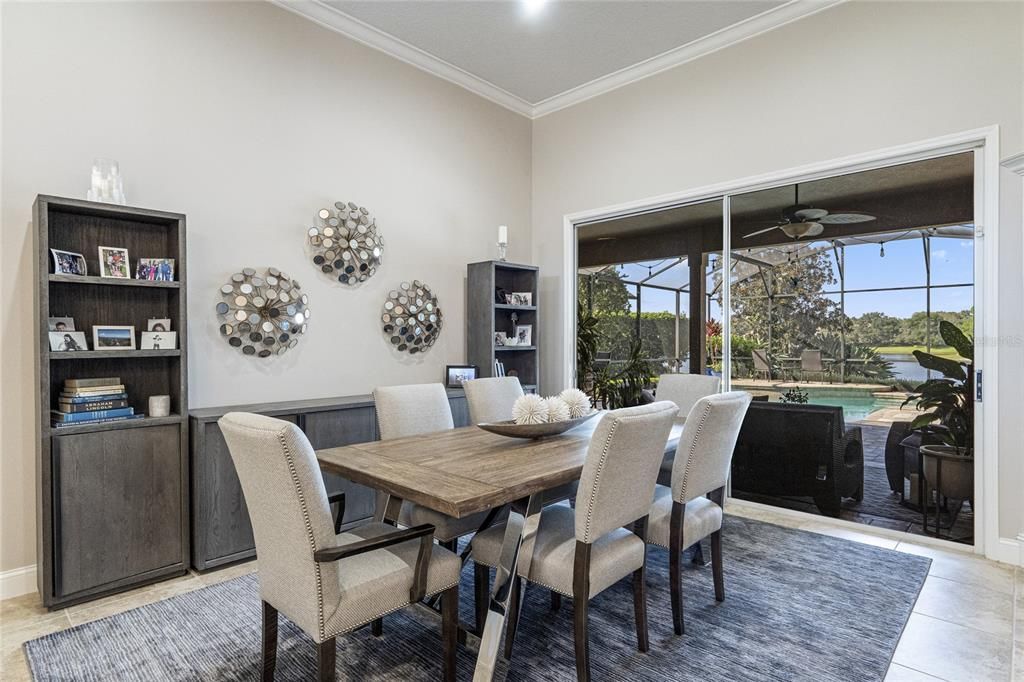 Dining room overlooking lanai and lake