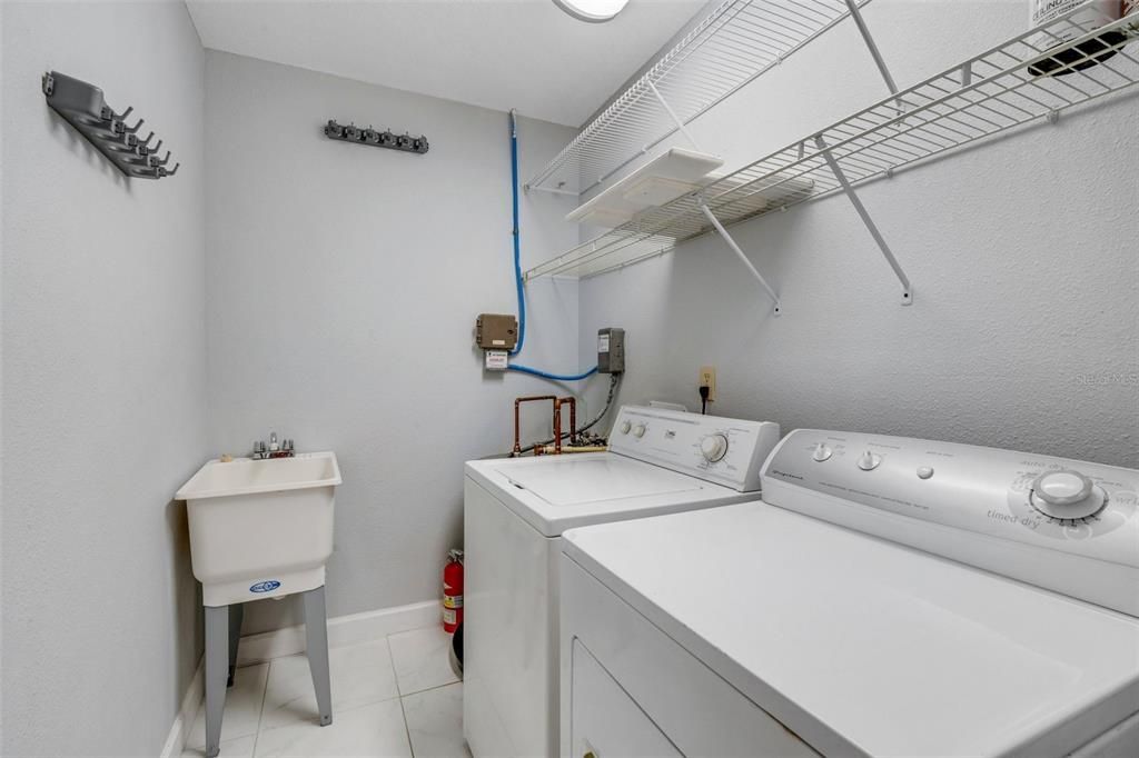 Laundry room with utility sink & extra storage space~