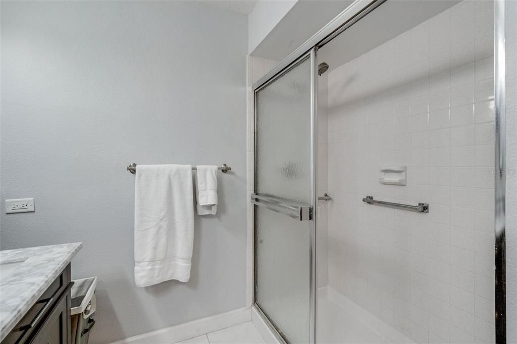 Step-in shower in the master suite~