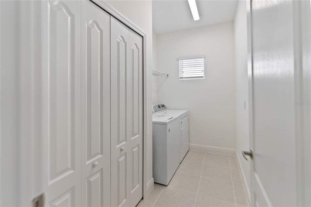 Laundry Room with Washer and Gas Dryer