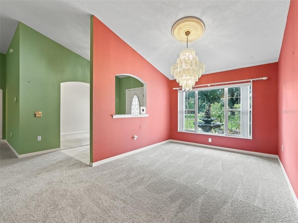 This would be the room off the entrance that could be a study, another extension of the living room with bright and cheerful windows.