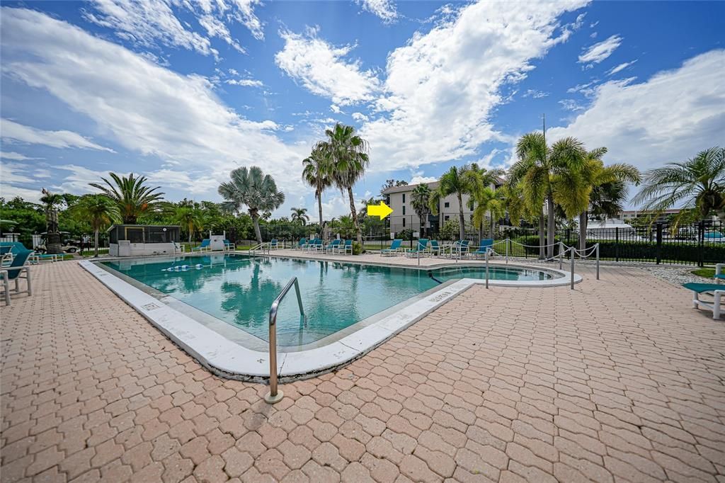 Community Pool with Condo in the Background