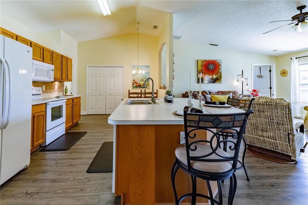 Kitchen with island and breakfast bar