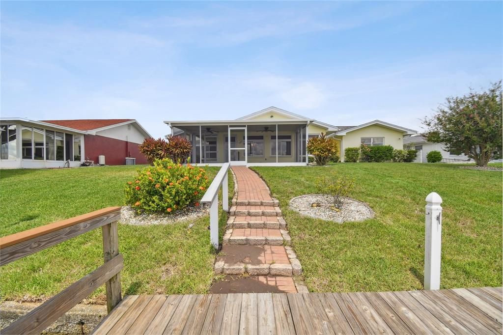 View from the dock to your screened lanai.