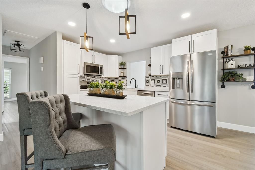 Enjoy the kitchen island for all your informal dining needs.