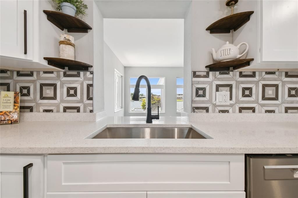 The backsplash really makes this kitchen POP!