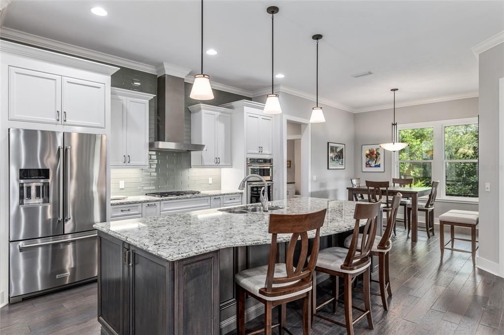 KITCHEN OPENS TO BREAKFAST AREA