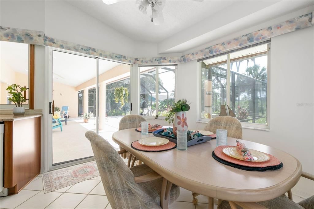 Kitchen nook with sliders out to screened lanai