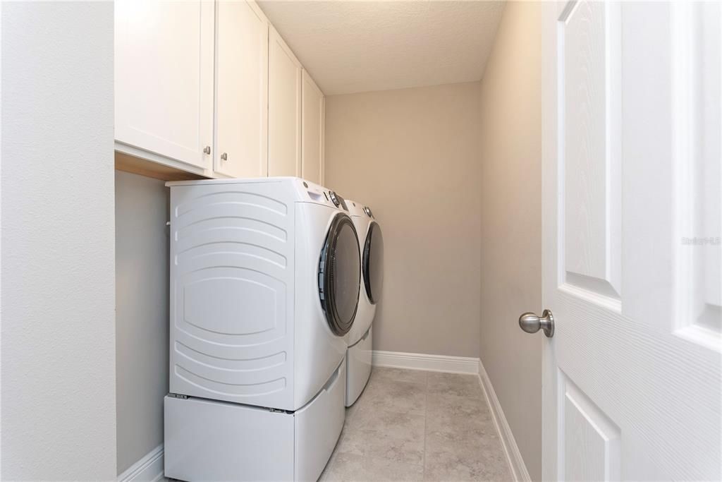 First floor laundry room; 1st floor.