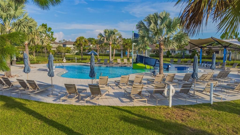 Community pool with waterslide.