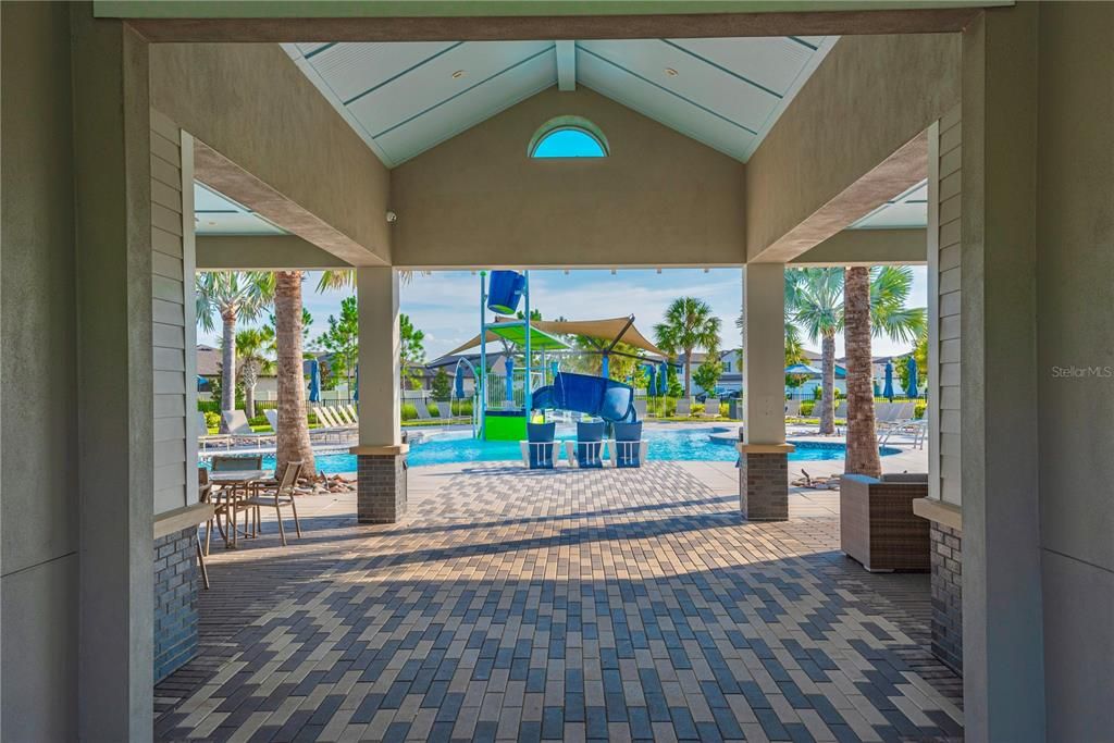 Entry into the community pool with plenty of seating.