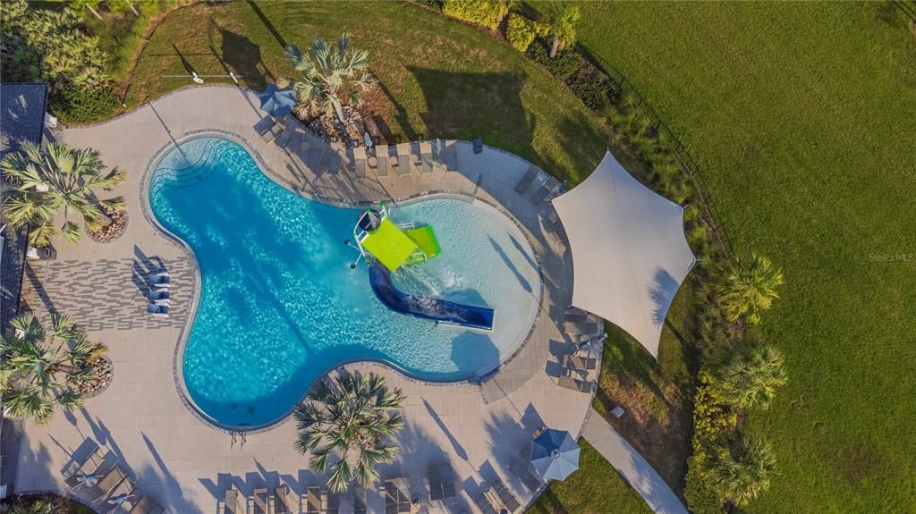 Community pool with sun shade.