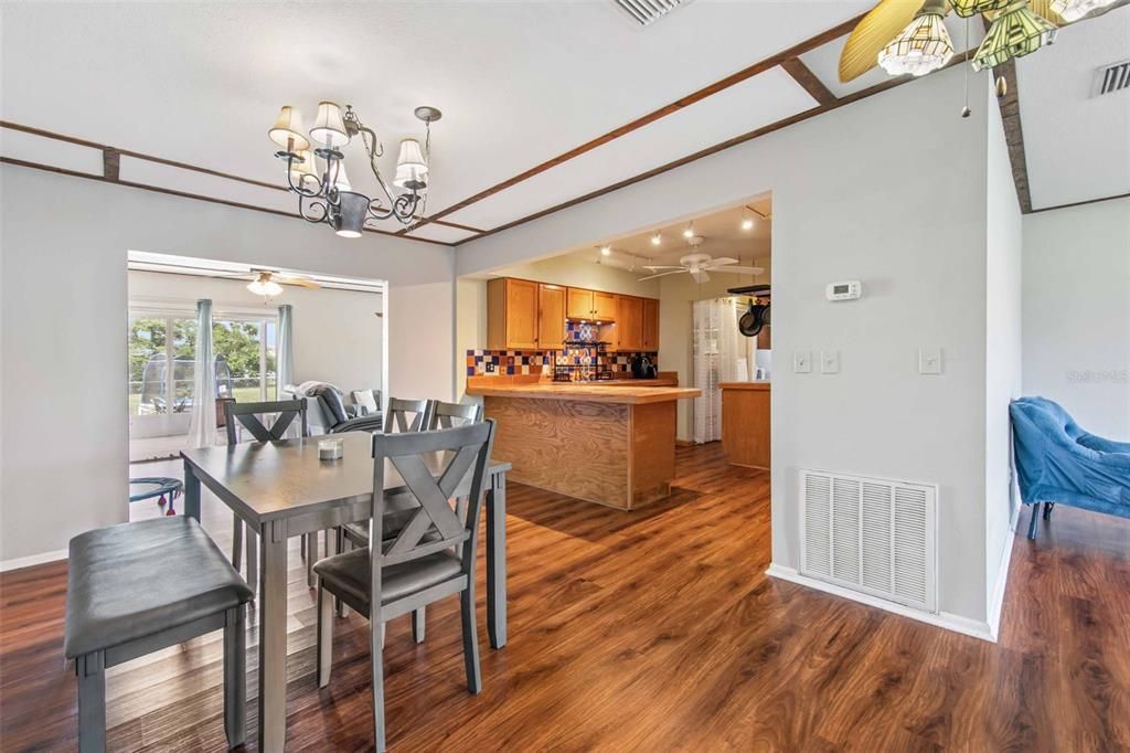 Dinette area to kitchen and family room