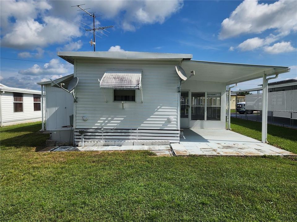 South side of home & covered back porch.