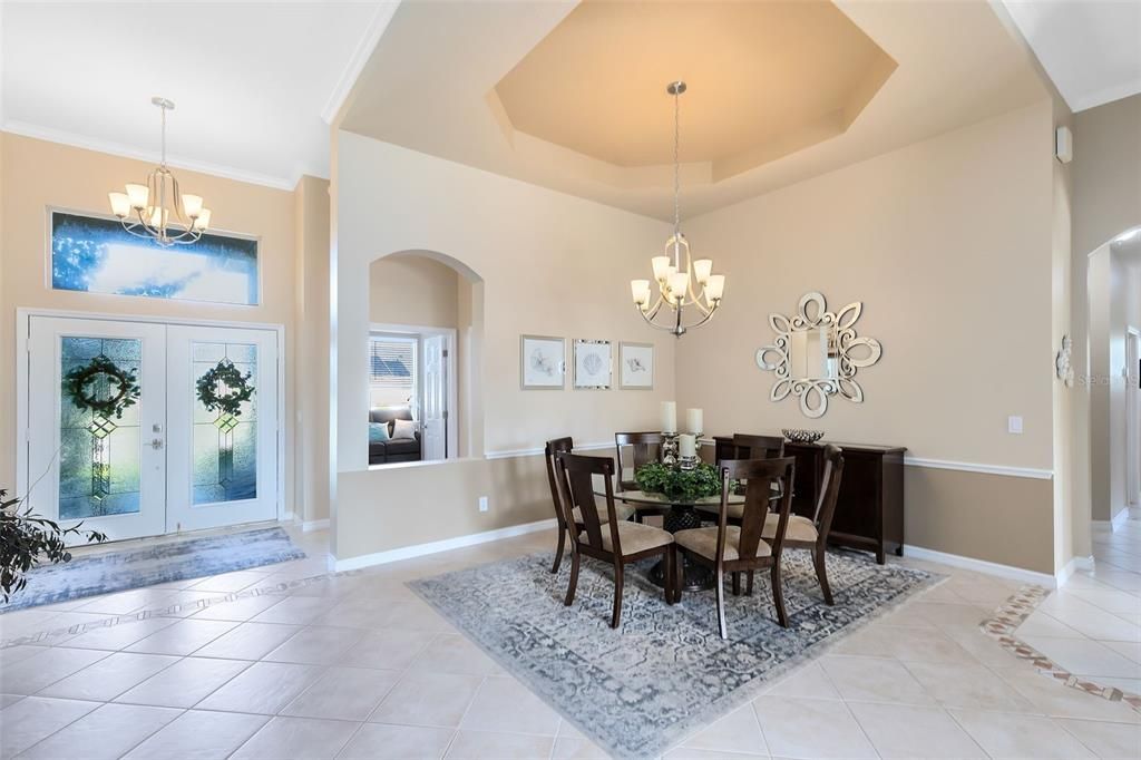 Enter through double glass doors to experience the volume ceilings, tasteful tile flooring, and decorative arches & ceilings. A spacious and open Dining room and living room will greet you with their grace and elegance.