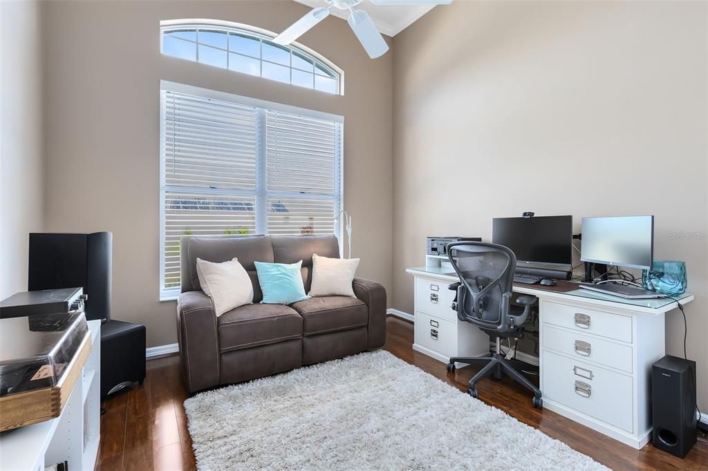 An office with closet in the front of the home can be a nursery, guest bedroom, etc. There is an adjacent 1/2 bath. (yes this home has 3 1/2 baths!)