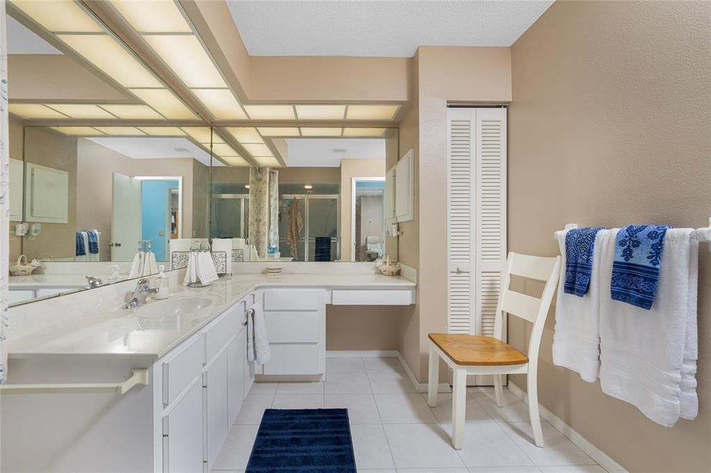 Main bath has tiled flooring and a linen closet!