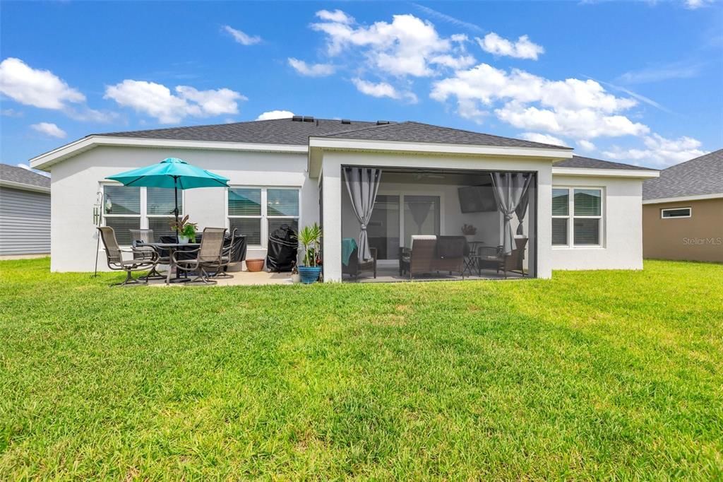 Back of House with Lanai and Grill Patio