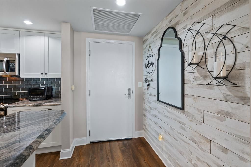 Front Door Entry with Textured Wall