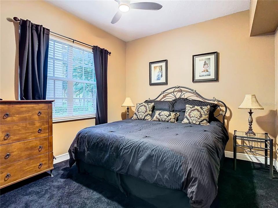 The guest bedroom with plush new carpeting.