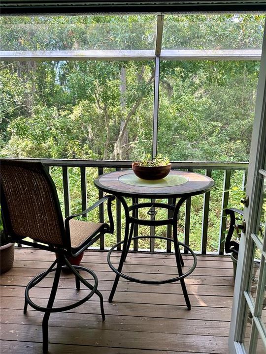 French doors to tranquil peaceful screened in patio