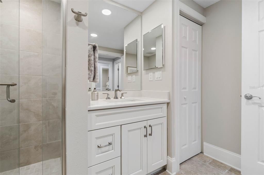 Beautifully Tiled 2nd Guest Suite with large pantry and Travertine floors