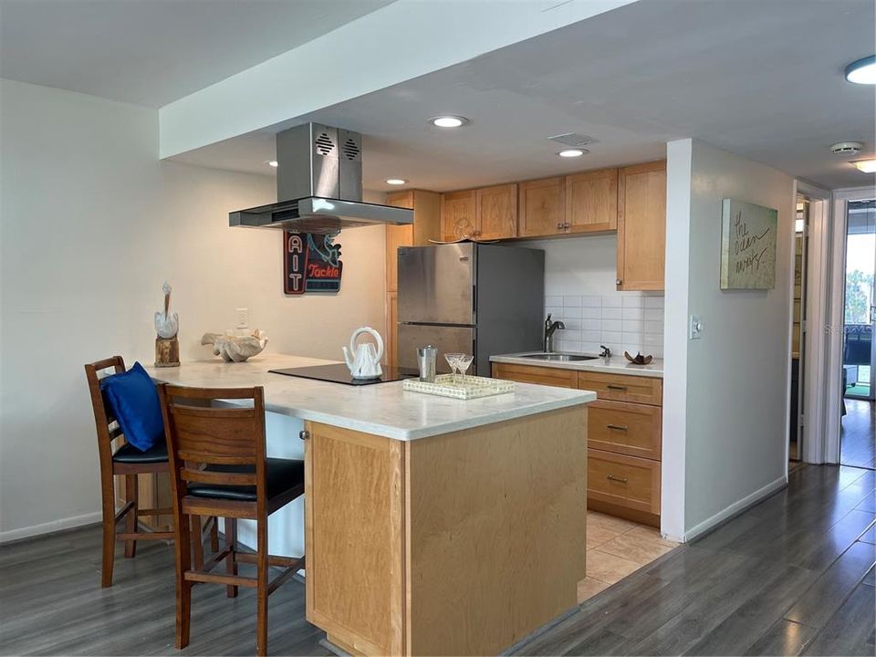 Kitchen has recessed lighting