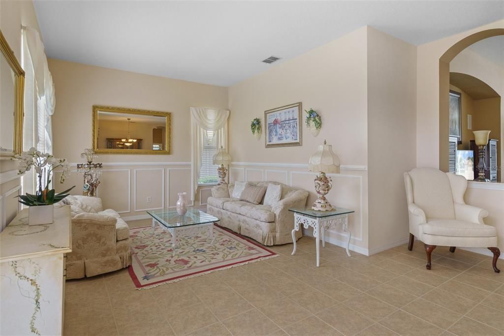 The Formal Living Room has Custom Wall Moldings