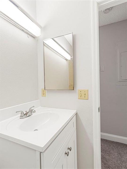 Second full bath with linen closet in hallway just outside...second bedroom just to right outside door...