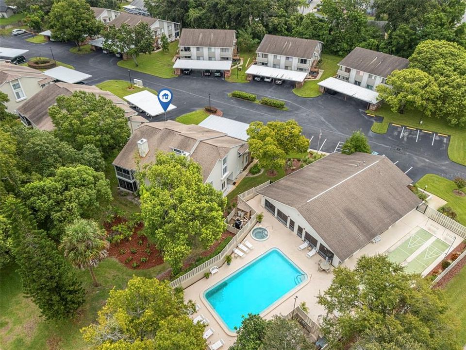 Aerial view of clubhouse, pool, and hot tub....condo is in building directly to left, just a short walk away!