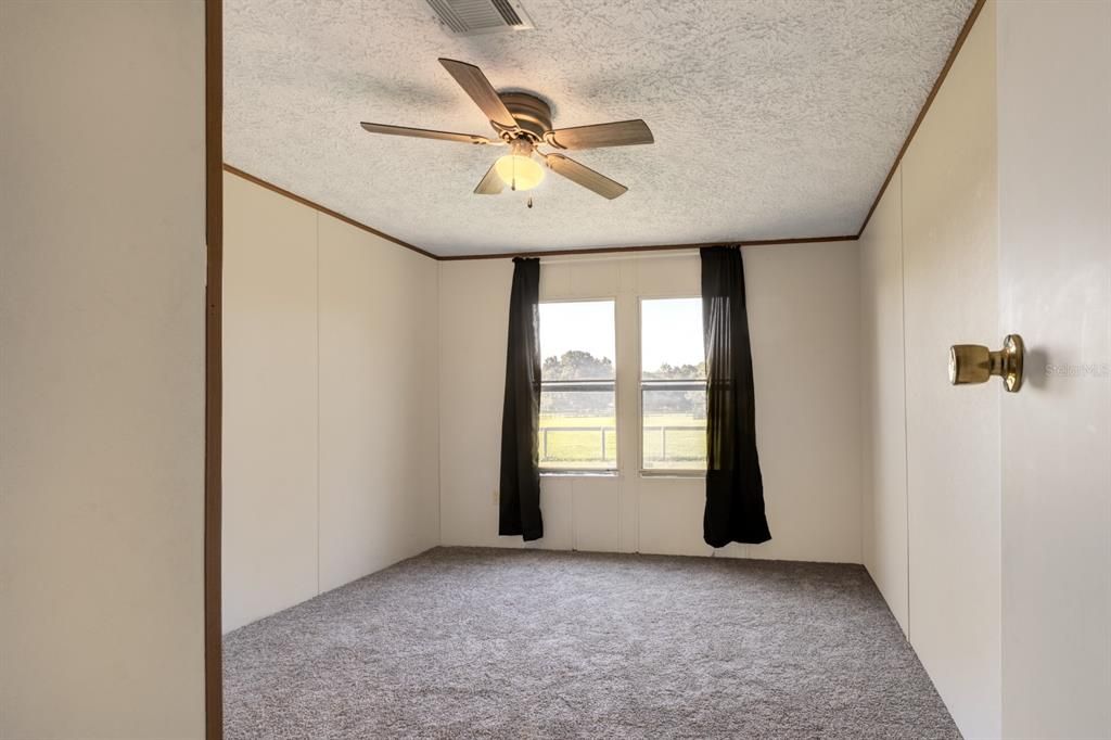 Bedroom 4 with new carpeting.