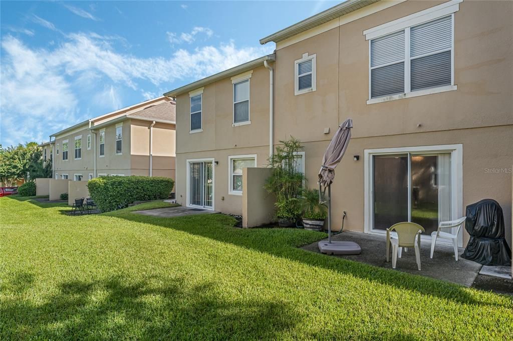 Rear patio with room for grill and seating