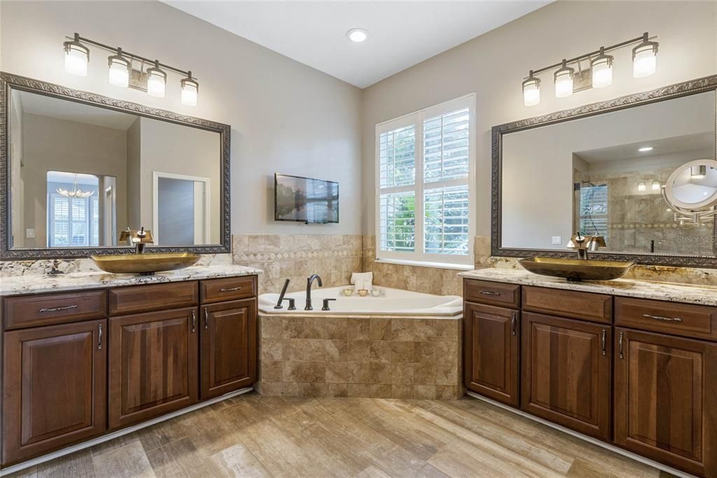 Dual vanities with granite, soaking tub & separate shower